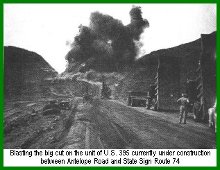 Blasting hillside for highway, 1952